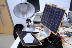 SOLAR TRACKING MAGNIFIER