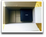 unboxing: black fujifilm box in amazon box