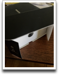 unboxing: black fuji box opened showing fingerhole